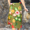 100% cotton sarong made in italy designed by lola pilar hawaii featuring hibiscus, anthuriums, and philodendron
