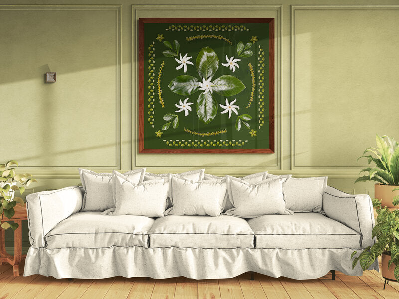 Living room with a white sofa, decorative wall art featuring tiare or tahitian gardenia from hawaii, and plants Honolulu Oahu Hawaii art print Lola Pilar Hawaii