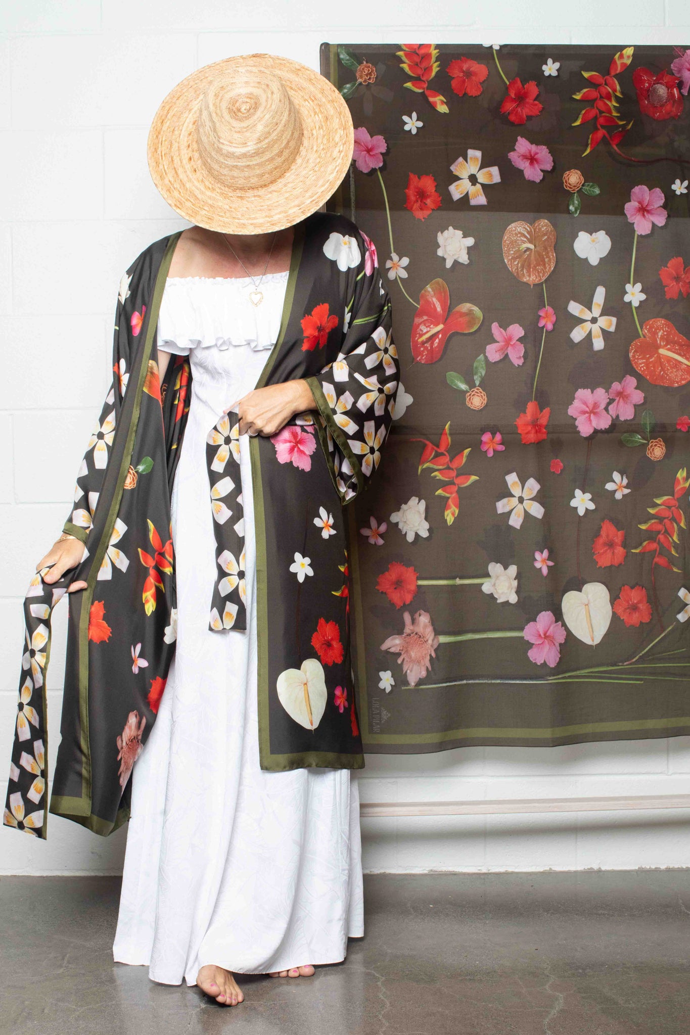 Chic moss green silk kimono robe with lush Hawaiian floral design inspired by luxury resort living and sophisticated island fashion.