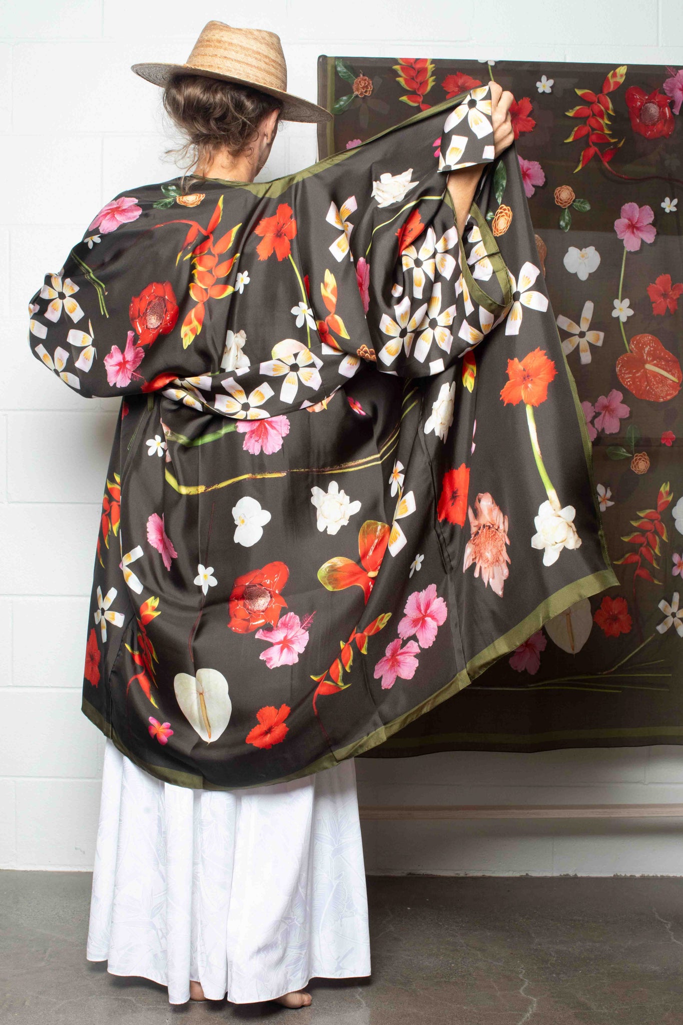 Elevated Hawaii-inspired silk robe in moss green with luxurious tropical floral artwork, designed in Hawaii and crafted in Italy by Lola Pilar.