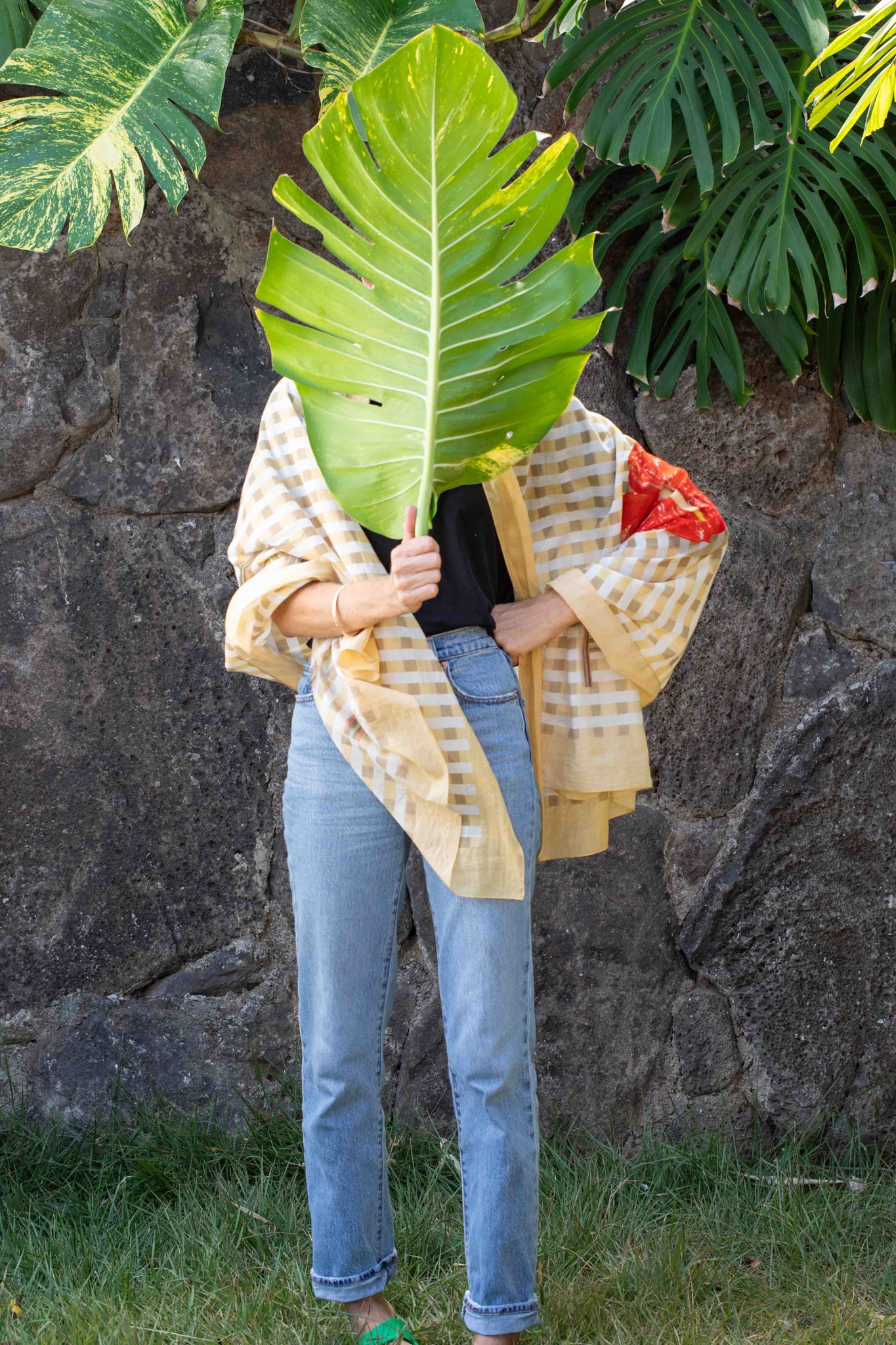 Luxury shawl made in Italy and designed in Hawaii featuring a yellow and white checkered pattern with red anthurium flower and “I Love Hawaii” design Lola Pilar