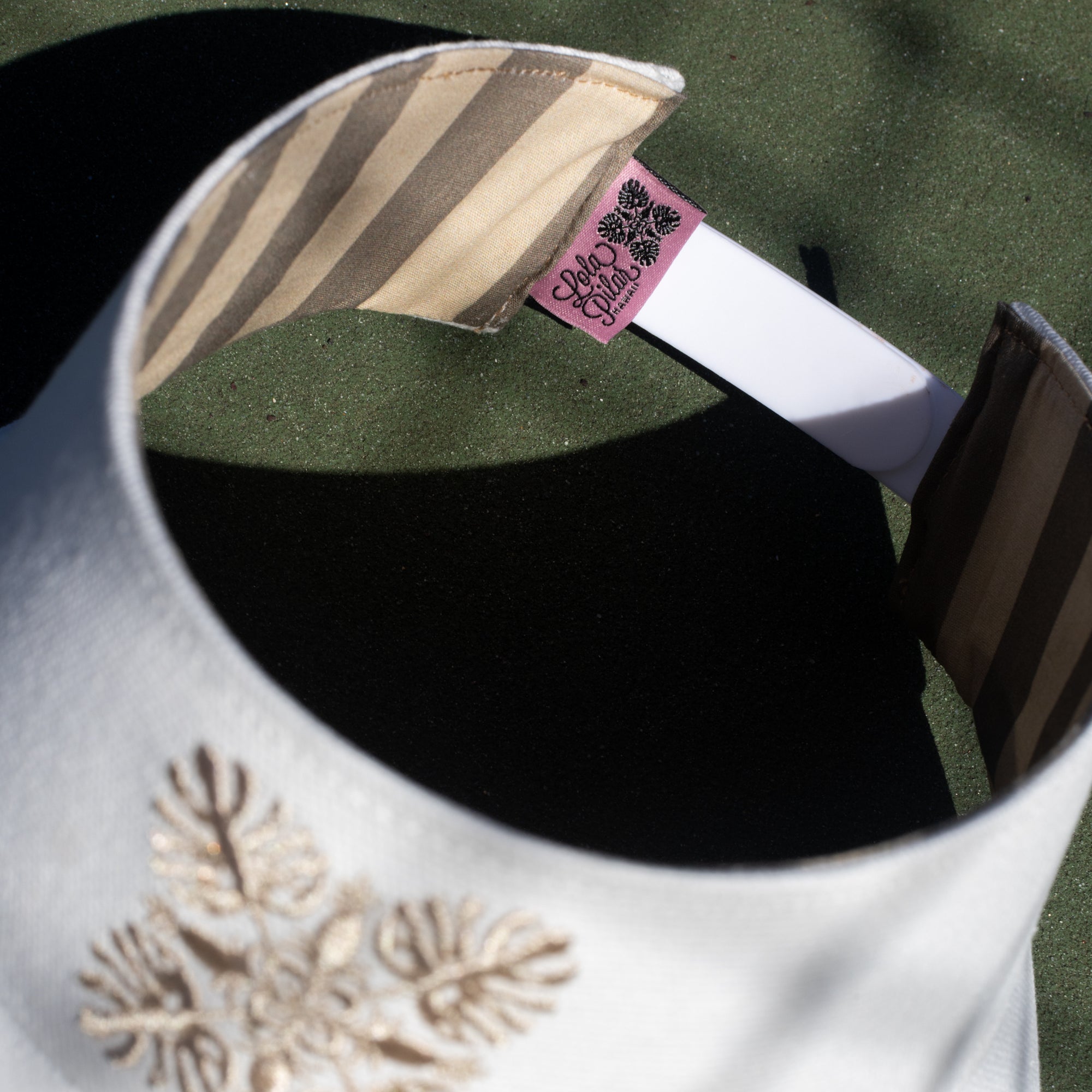 cream wide brim visor, lola pilar, stripe inside, snapback