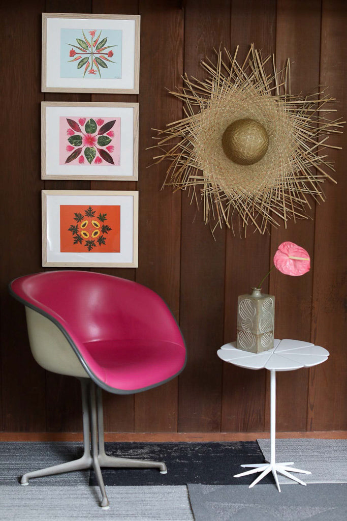 Three pieces of fine art inspired by the Hawaiian quilt make the living space come together