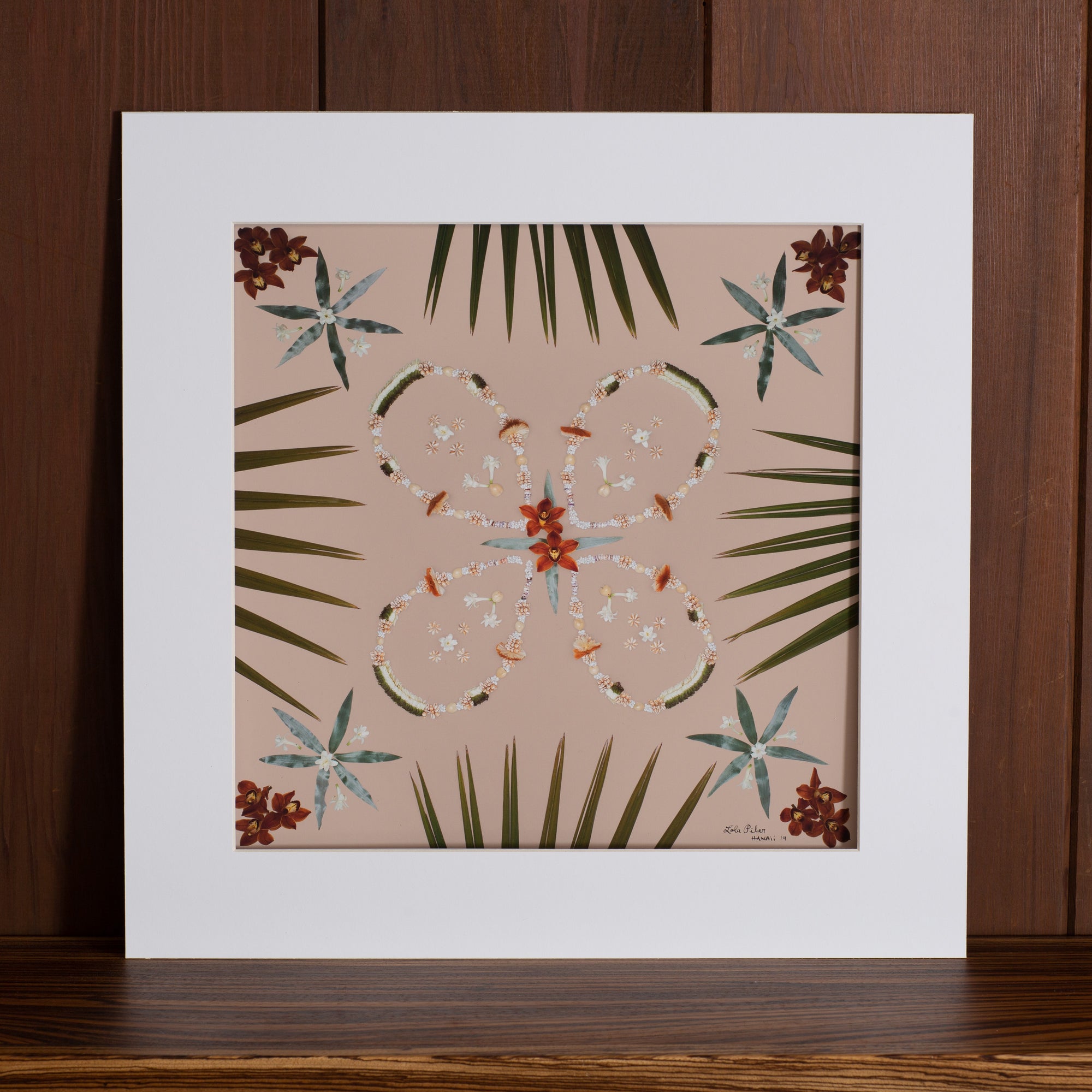 palm artwork using fresh local flowers found throughout hawaii and leis