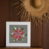 limited edition 16x16 photograph of anthuriums and variegated hau tree leaves