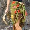 pualani pareo aka sarong featuring anthuriums, hibiscus, hibiscus leaves, and philodendron designed in hawaii made in italy